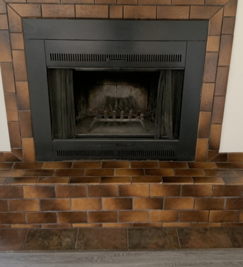 Tile fireplace before
